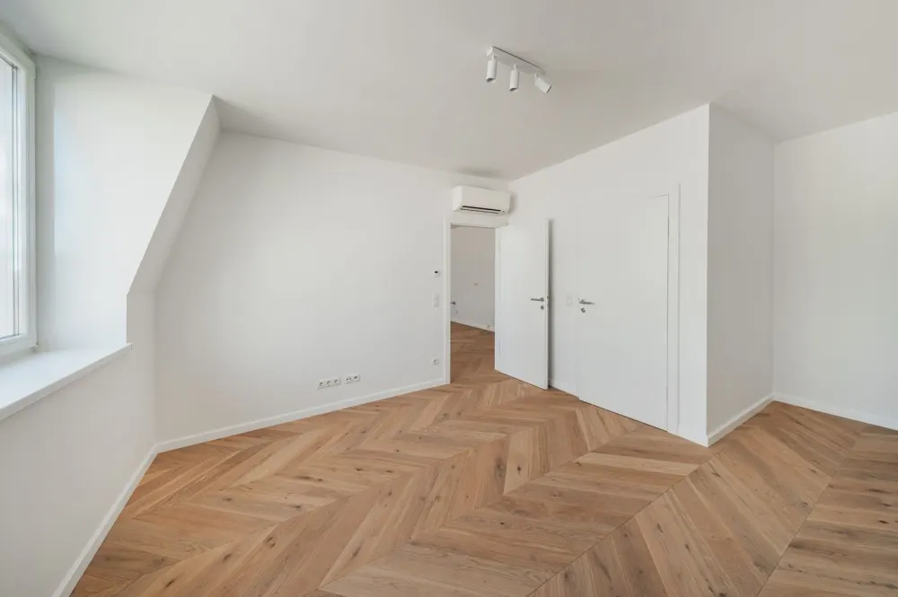 KITZIMMO-Exklusives Dachgeschoss-Apartment kaufen - Immobilien Wien.