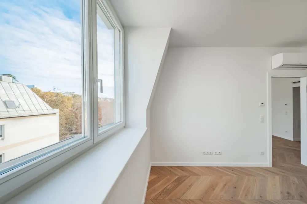 KITZIMMO-Exklusives Dachgeschoss-Apartment kaufen - Immobilien Wien.