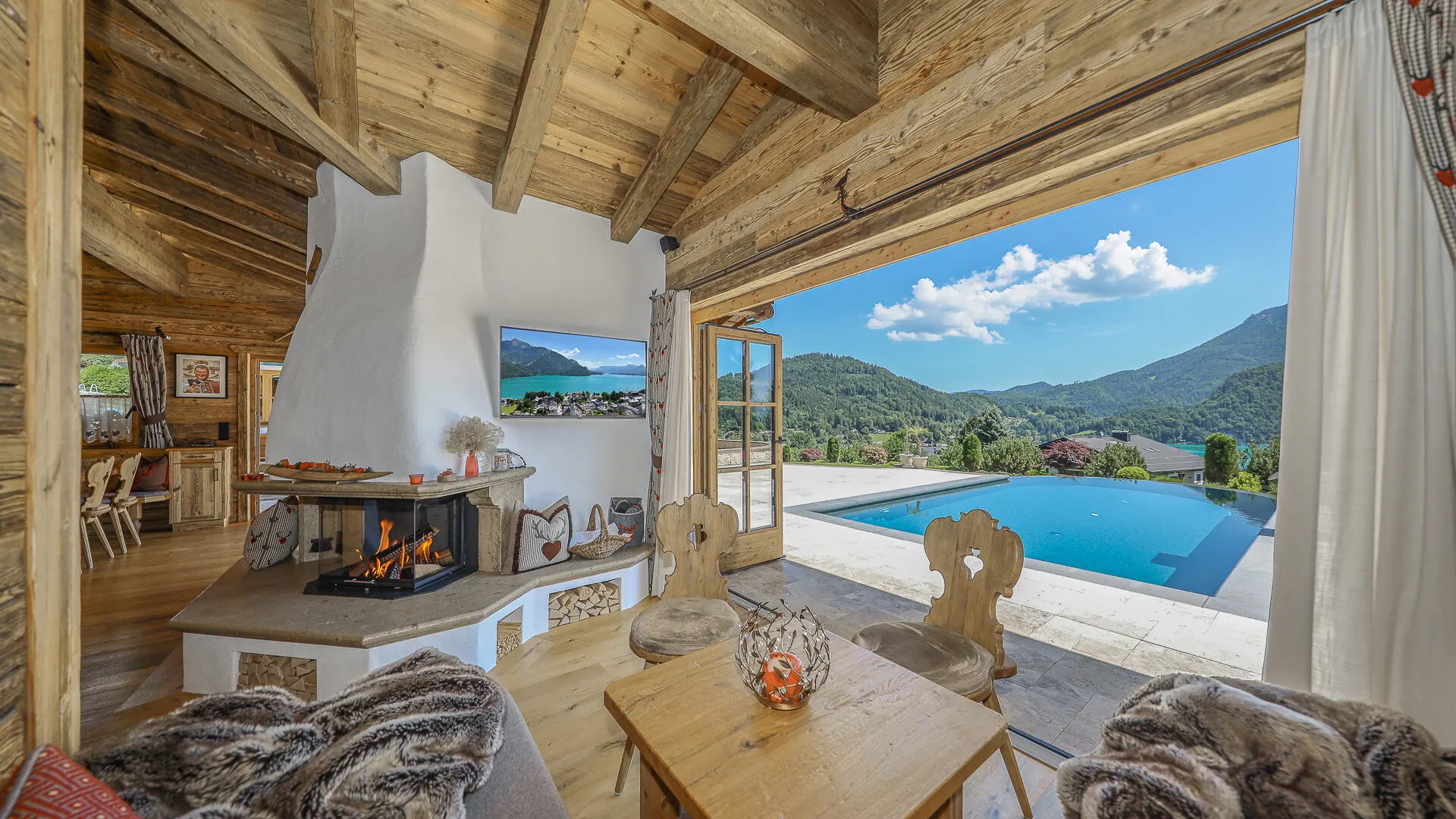 KITZIMMO-Einzigartige Landhausvilla mit Pool und unverbaubarem Seeblick - Immobilien St. Gilgen.