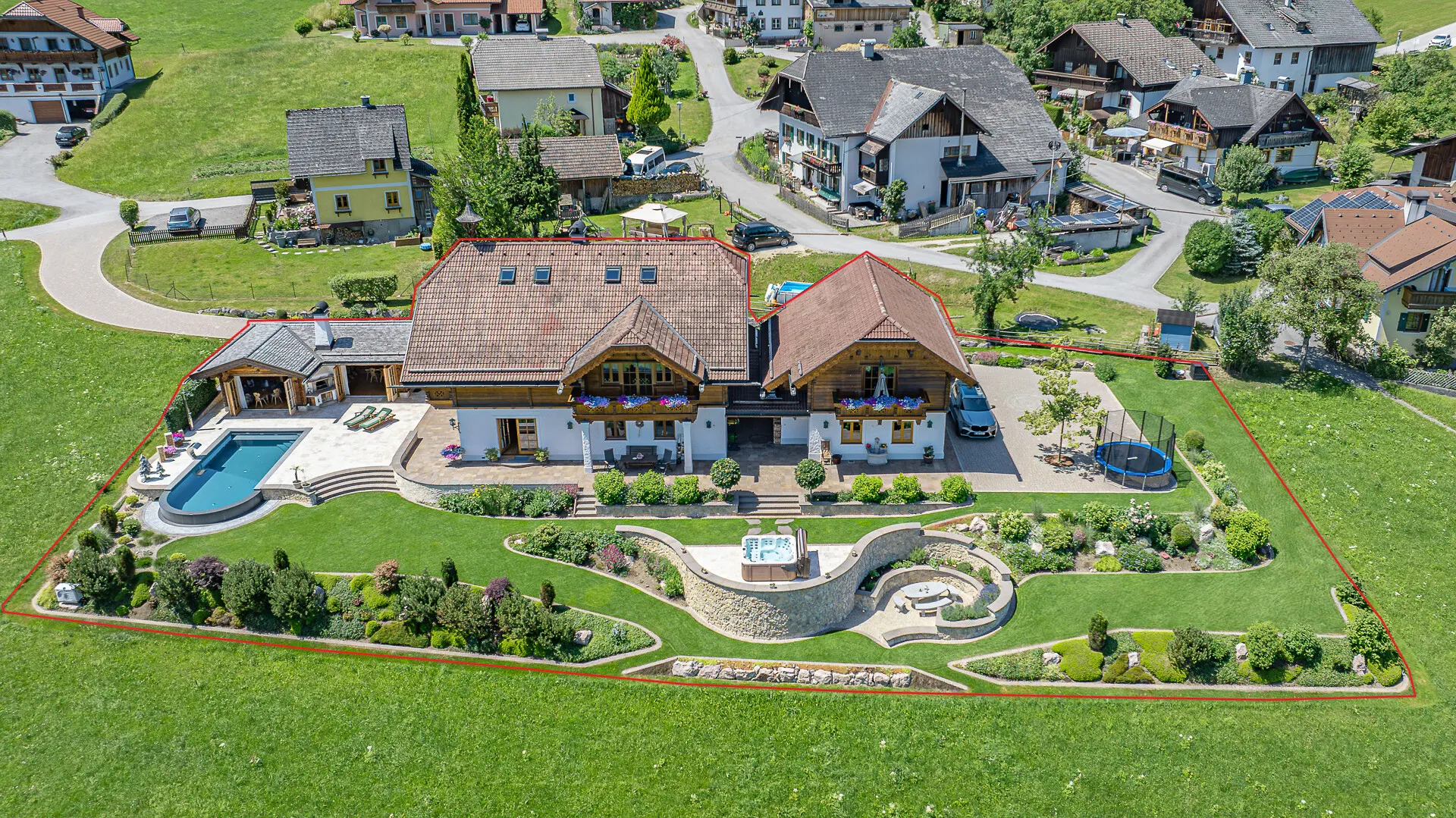 KITZIMMO-Einzigartige Landhausvilla mit Pool und unverbaubarem Seeblick - Immobilien St. Gilgen.
